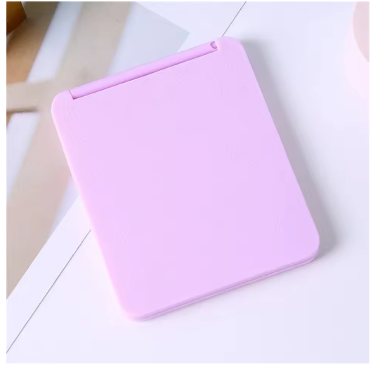 Espejo de Maquillaje Plegable Portátil Doble Cara – Elegancia Compacta para tu Tocador o Bolso